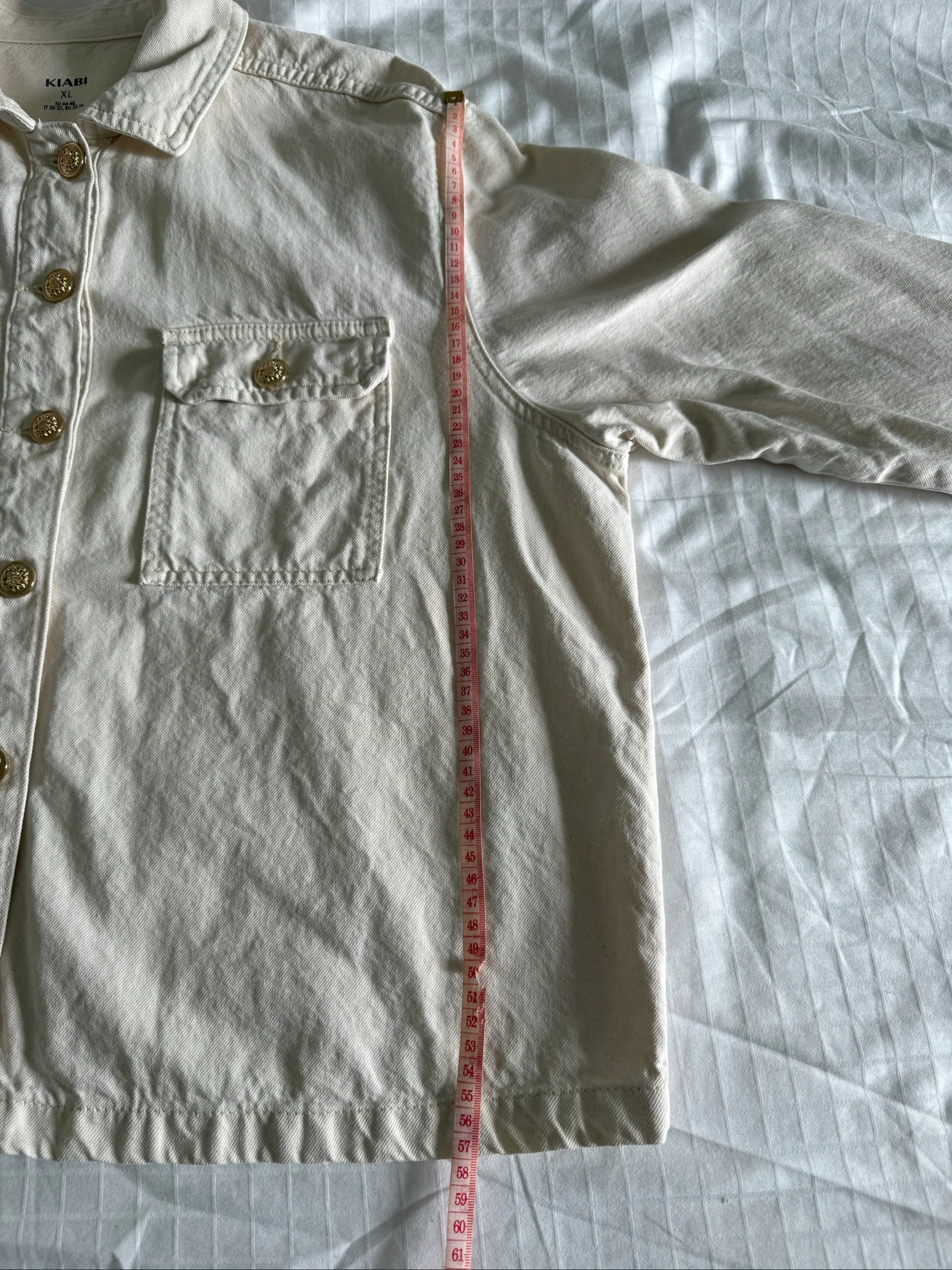 Chaqueta vaquera crema con botones dorados - Kiabi - XL – photo 10